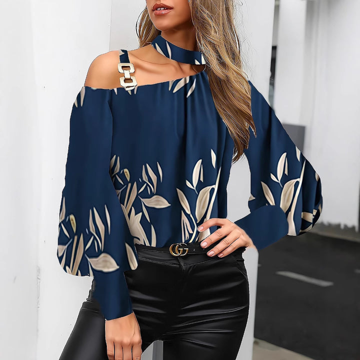 Dame moderigtig top med asymmetrisk snit og florale accenter Stilla