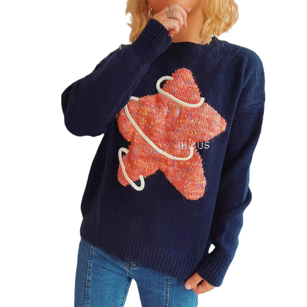 Kvindernes strikkede sweater med glitrende stjerne motiv og løs pasform Stilla