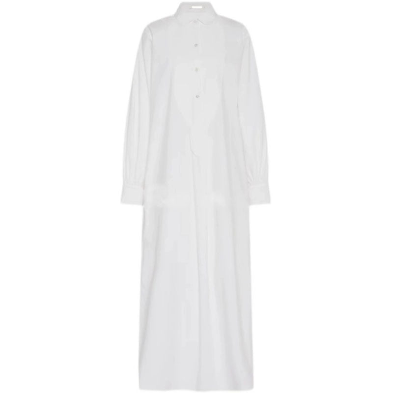 Dame langærmet skjorte med elegant knaplås og asymmetrisk kant Stilla