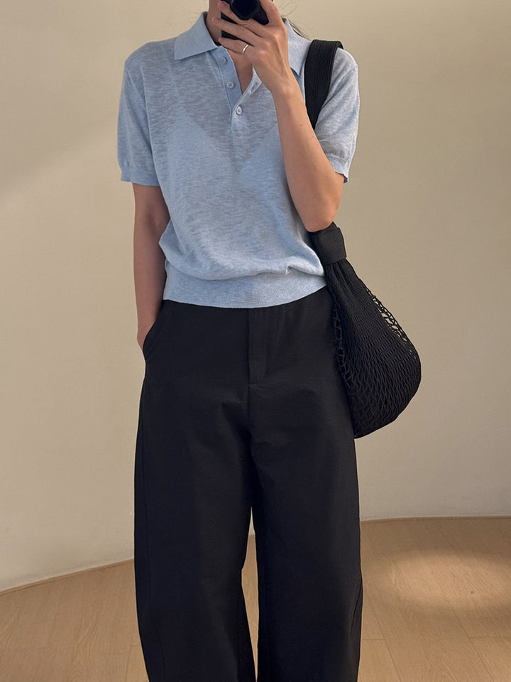 Dame poloshirt med fin struktur og elegant knaplukning Stilla
