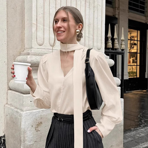 Dame elegant bluse med asymmetrisk binde detalje og voluminøse ærmer Stilla