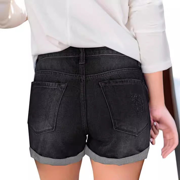 Dame jeansshorts med moderne rivdetaljer og afslappet snit Skovae