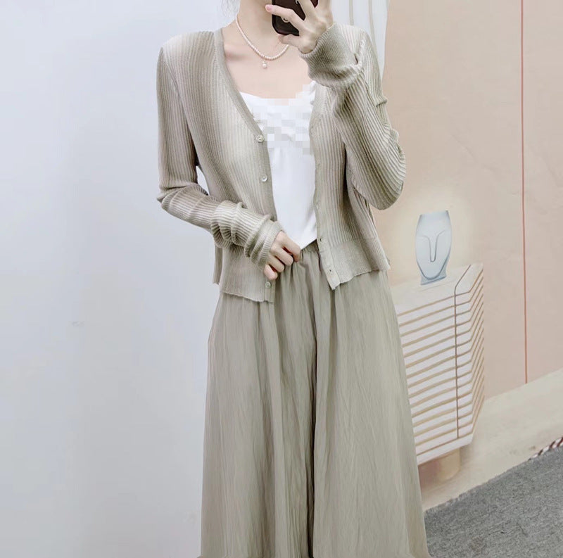 Dame elegant strikcardigan med moderne knapdetaljer og afslappet snit Stilla