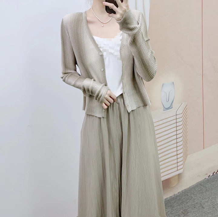 Dame elegant strikcardigan med moderne knapdetaljer og afslappet snit Stilla