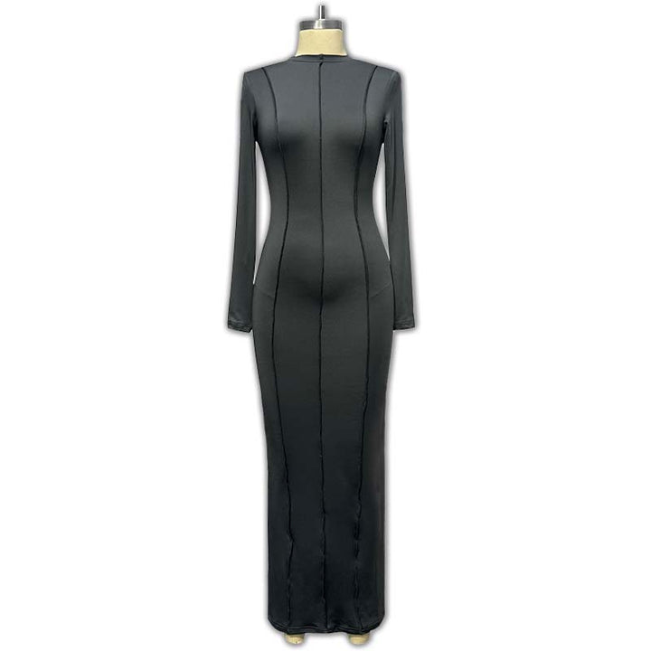 Dame langærmet kjole med elegant ståkrave og figursyet design Stilla