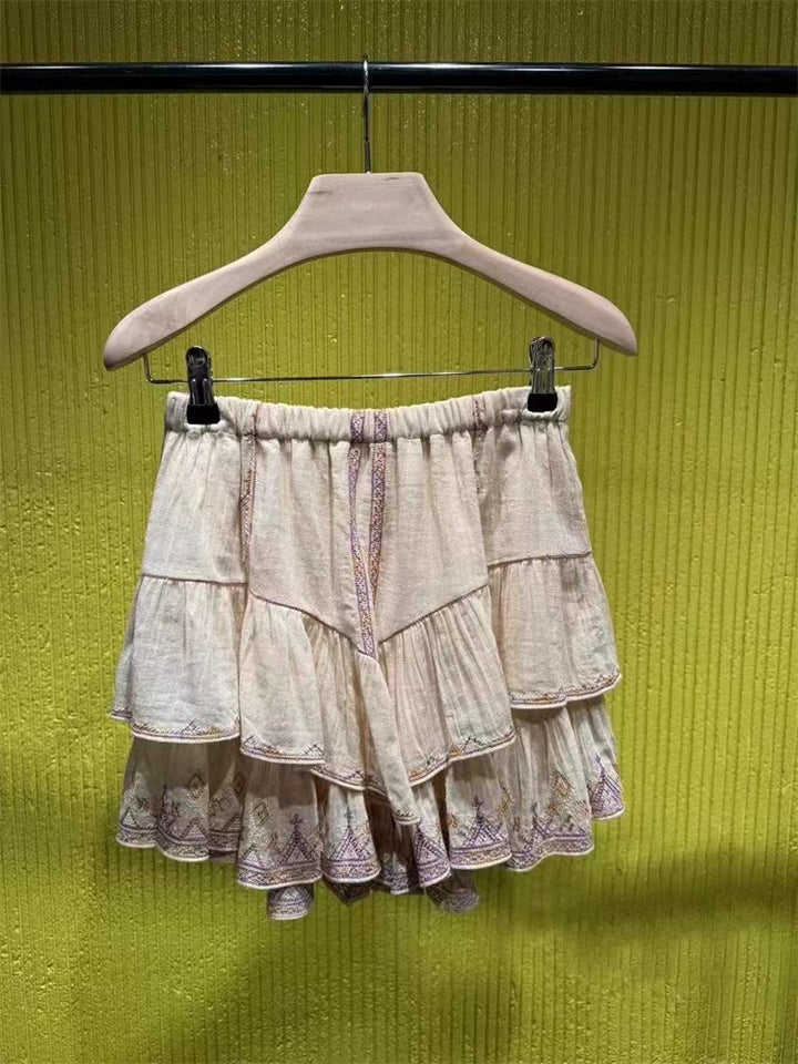 Damebluse med detaljeret broderedesign og fransede accenter Stilla
