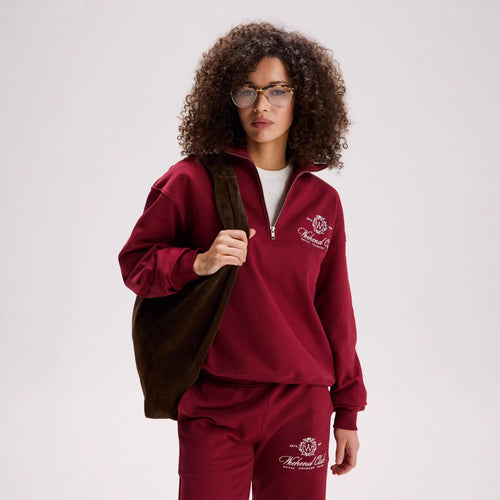 Kvindernes sporty zip-pullover med en afslappet pasform og elegant broderi Stilla