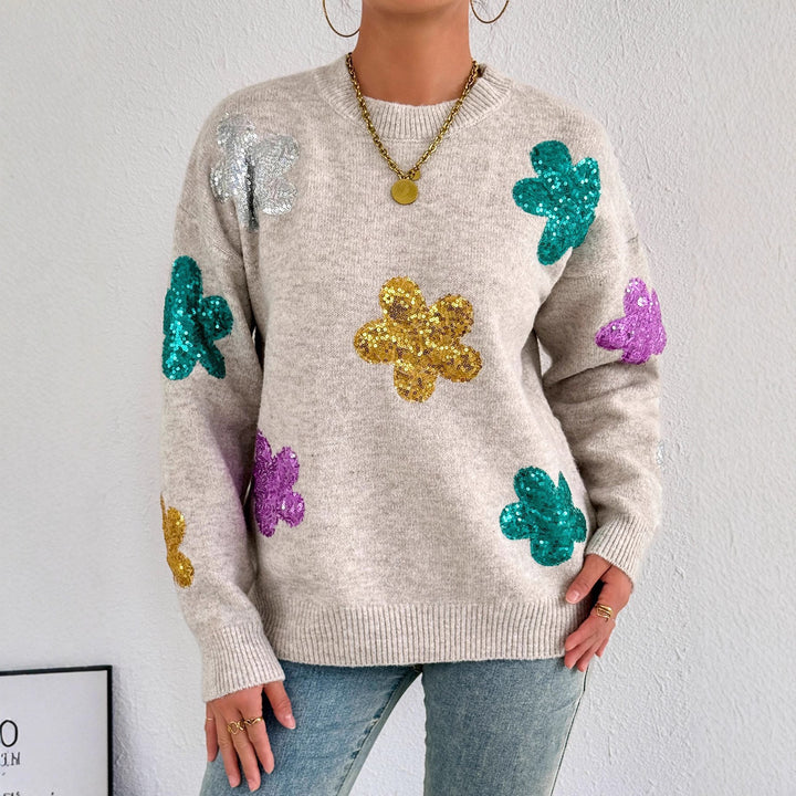 Kvindernes glitrende oversized sweater med blomstermotiv Stilla