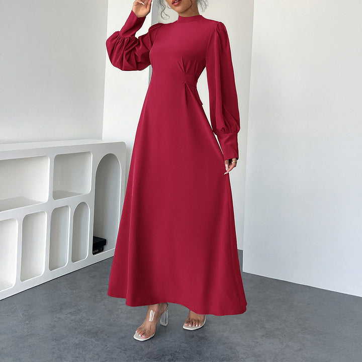 Dame maxikjole med elegante pufærmer og figursyet silhuet Stilla
