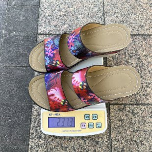 Dame komfortable slide-sandaler med florale accenter og ergonomisk fodseng Stilla