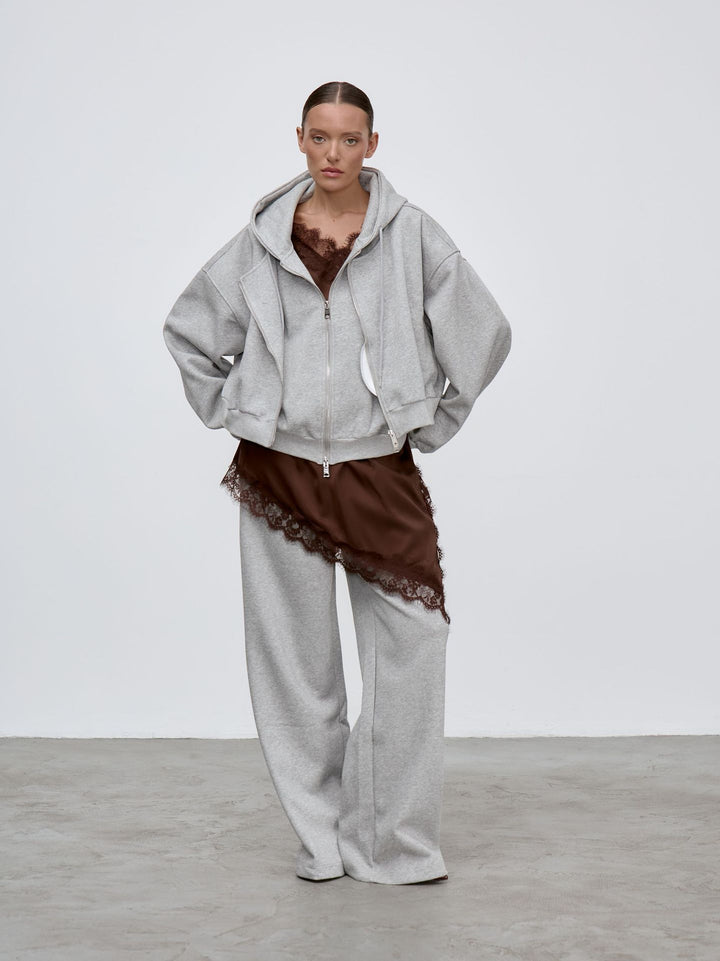 Damernes oversized hoodiejakke med generøse lommer og stilfuldt design Stilla