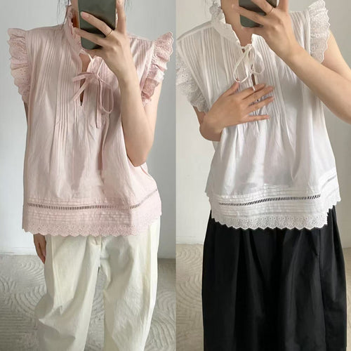 Damebluse med sarte flæse detaljer og feminin hulbroderi Stilla