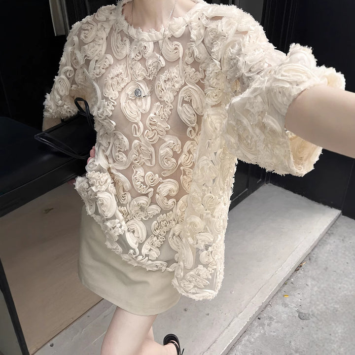 Damebluse med detaljerede 3D-blomsterapplikationer Stilla