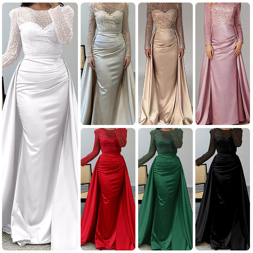 Kvinders aftenkjole med glitrende paillet top og elegant satin nederdel