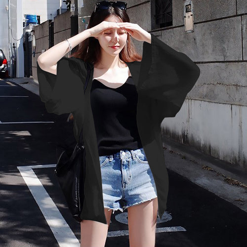 Damer elegant kimono jakke med en løs pasform og detaljeret designede ærmer