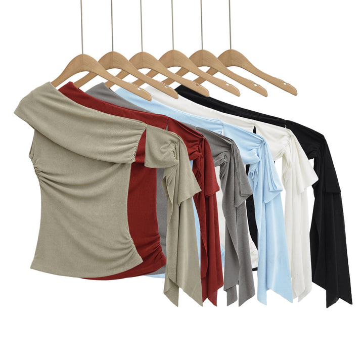 Dame stilfuldt, asymmetrisk top med raffinerede draperingselementer Stilla