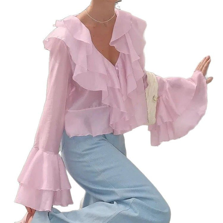 Dame rynkebluse med voluminøse ærmer og elegant design Stilla