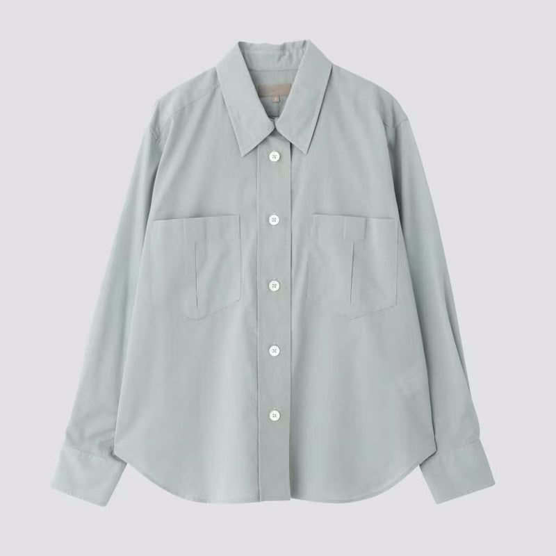 Dame klassisk bomuldsbluse med praktiske brystlommer og elegant snit Stilla