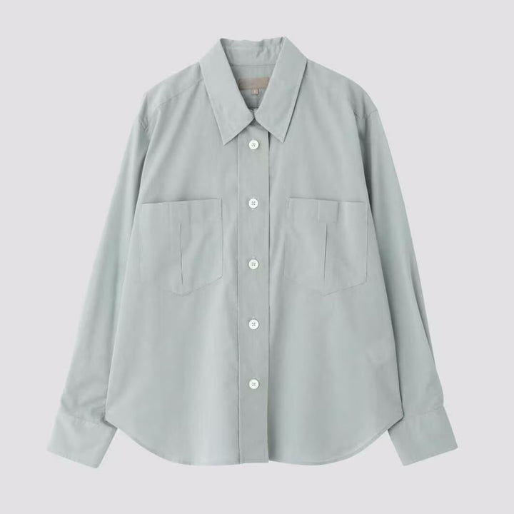 Dame klassisk bomuldsbluse med praktiske brystlommer og elegant snit Stilla