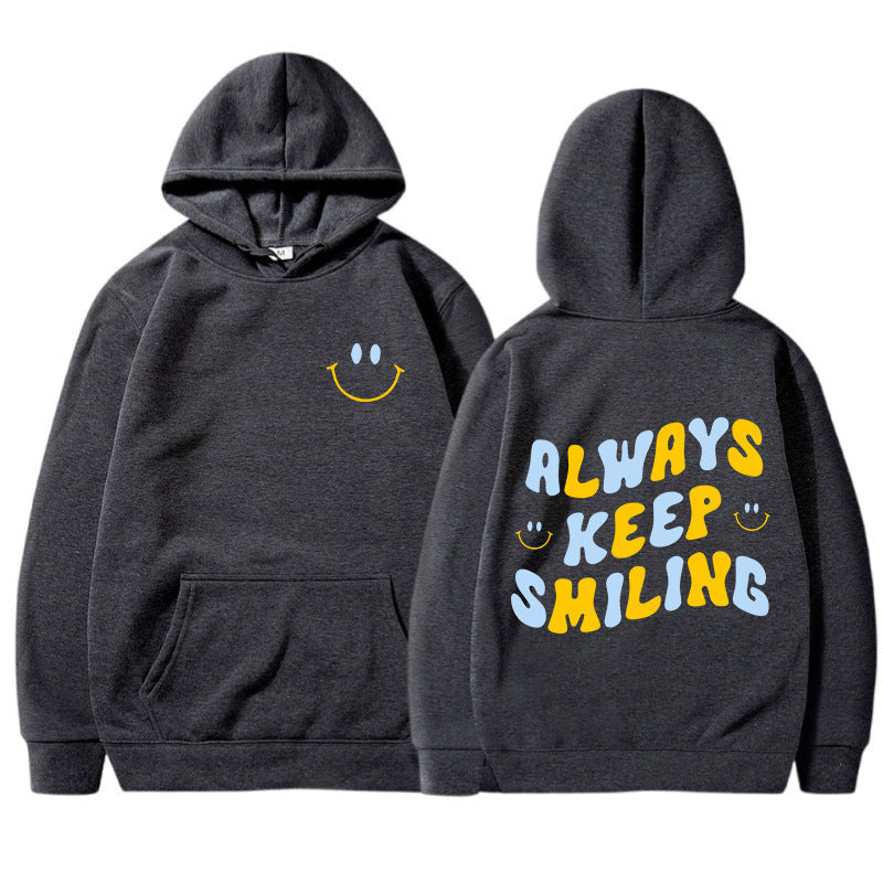 Dame hoodie med munter skrift og praktiske kangaroo lommer Skovae