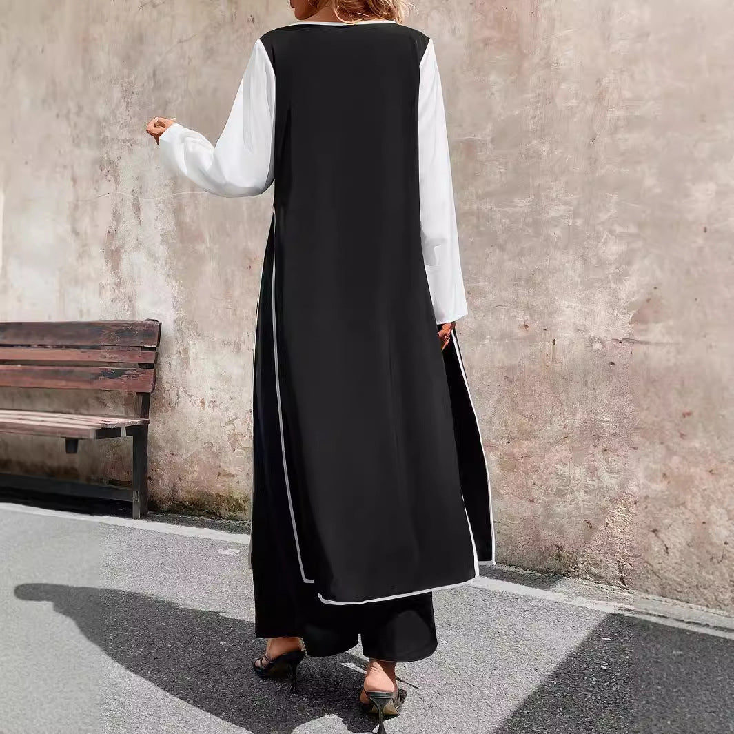 Dame elegant Langjakke med bindebælte i taljen og moderne farvekombination Stilla
