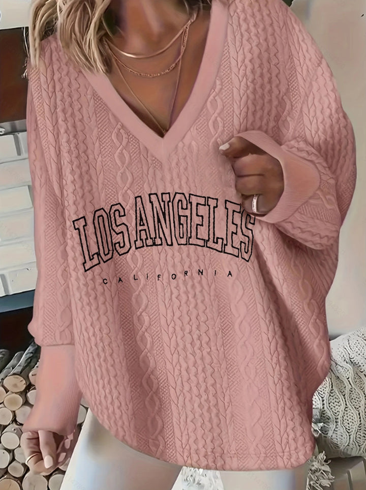 Kvindernes afslappede V-hals sweater med kabelmønster Stilla