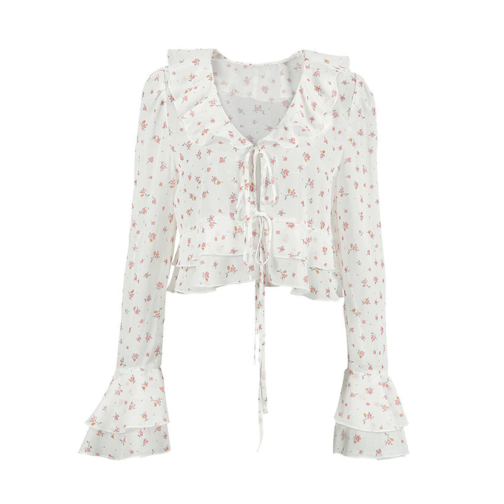Damebluse med rynker og blomsterdesign Stilla