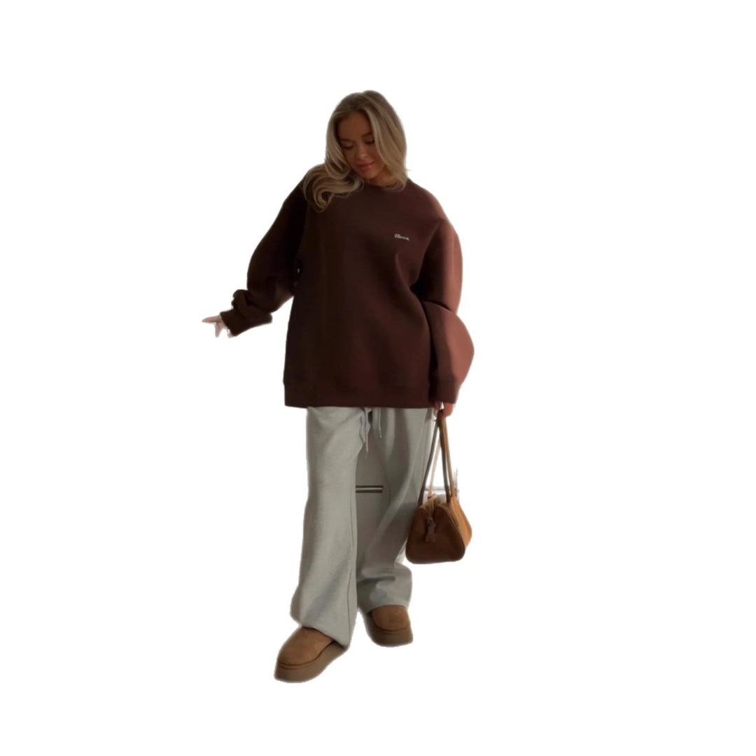 Kvinders casual oversized sweater med rund hals og diskret logo Stilla