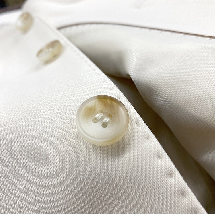 Dame elegant vest med fine guldknapdetaljer Stilla