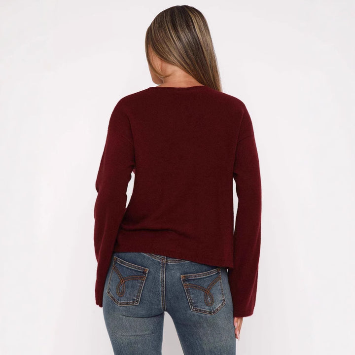 Damer mode cardigan med innovativ snøredesign og oversized ærmer Stilla