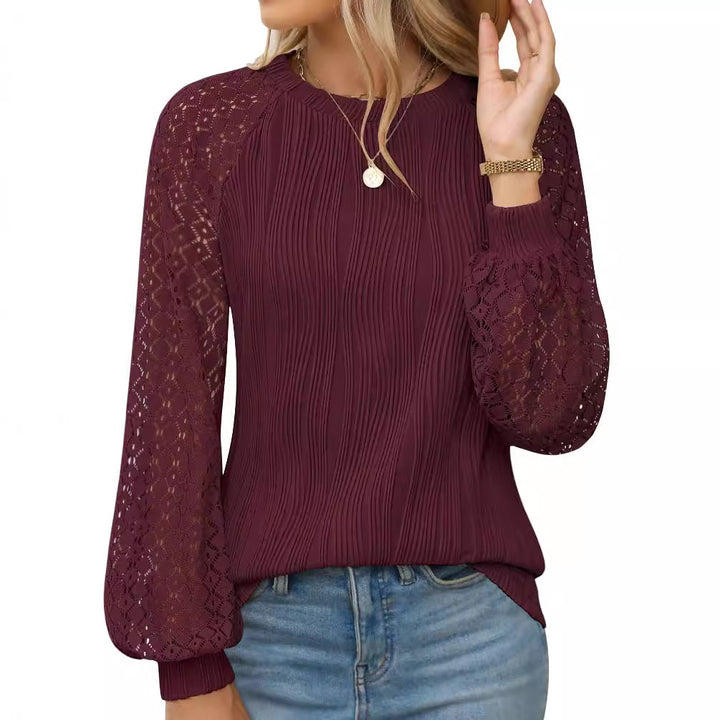 Dame strikbluse med elegante hæklede kanter og voluminøse ærmer Stilla