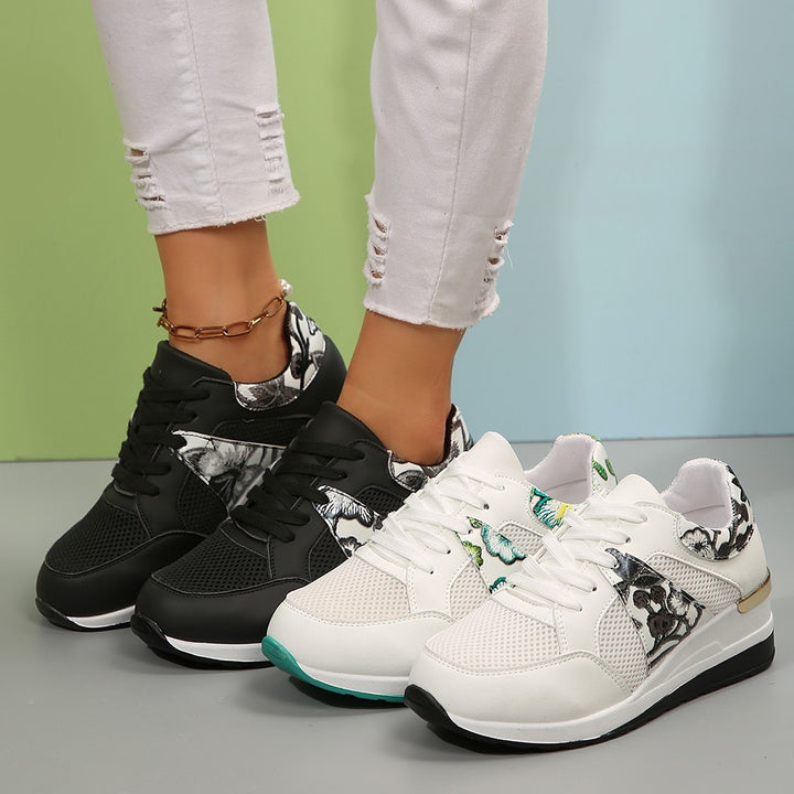 Dame Sneakers med luftig mesh-overflade og elegante florale accenter Stilla