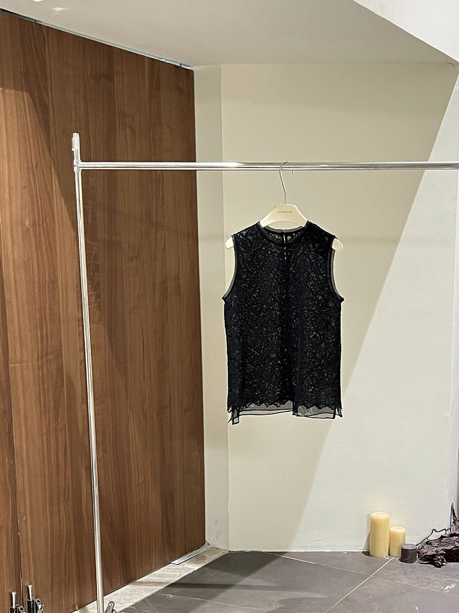 Dame ærmeløst spidsetop med fin struktur og moderne design Stilla