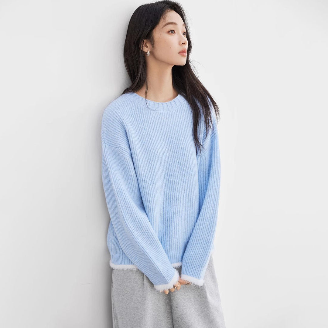 Kvinders fluffy sweater med en løs pasform og moderne ribbede detaljer Stilla
