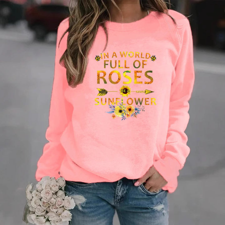 Dame sweatshirt med inspirerende design og blomsterdekoration Stilla