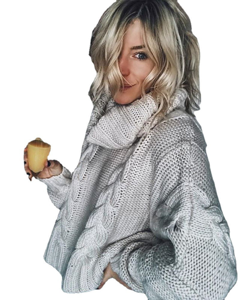 Kvindernes cropped strikkede sweater med rullbar krave og kabelmønster Stilla