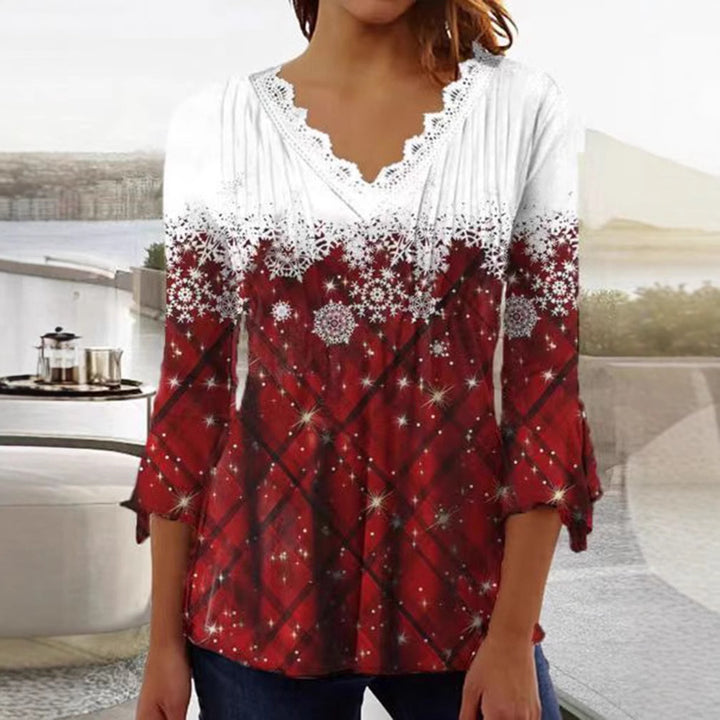 Dame nan tunika-bluse med spids v-hals, fin plissé-patch og vinterligt snefnug-print skovae