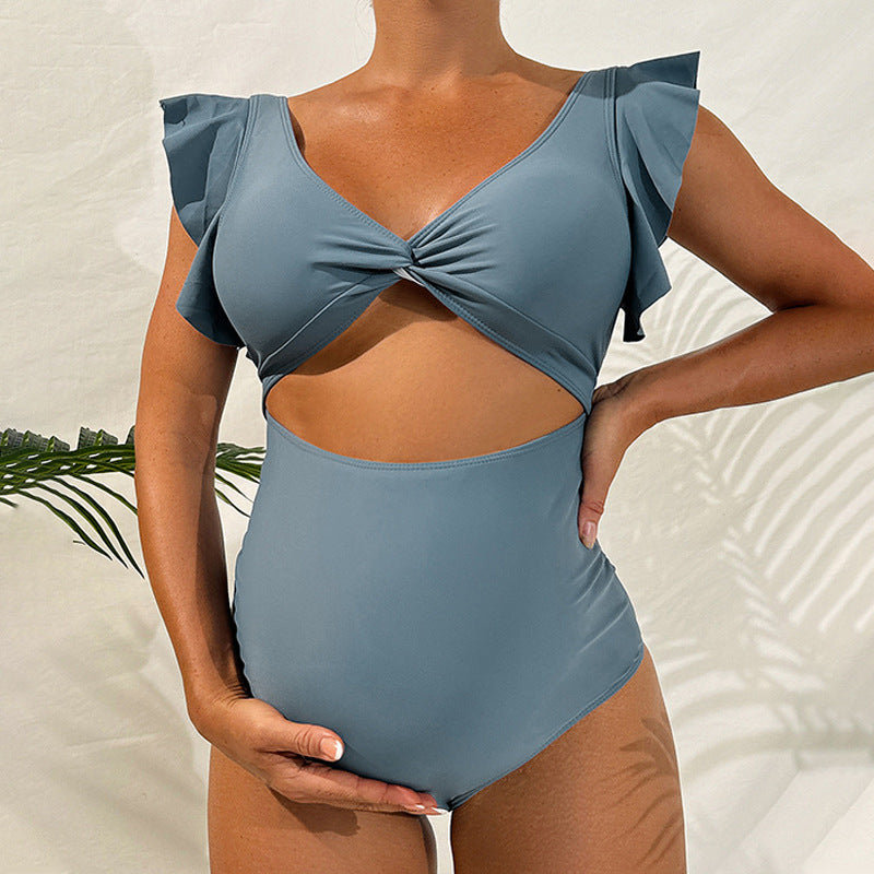 Dame one-piece swimsuit with romantic ruffle details Skovae