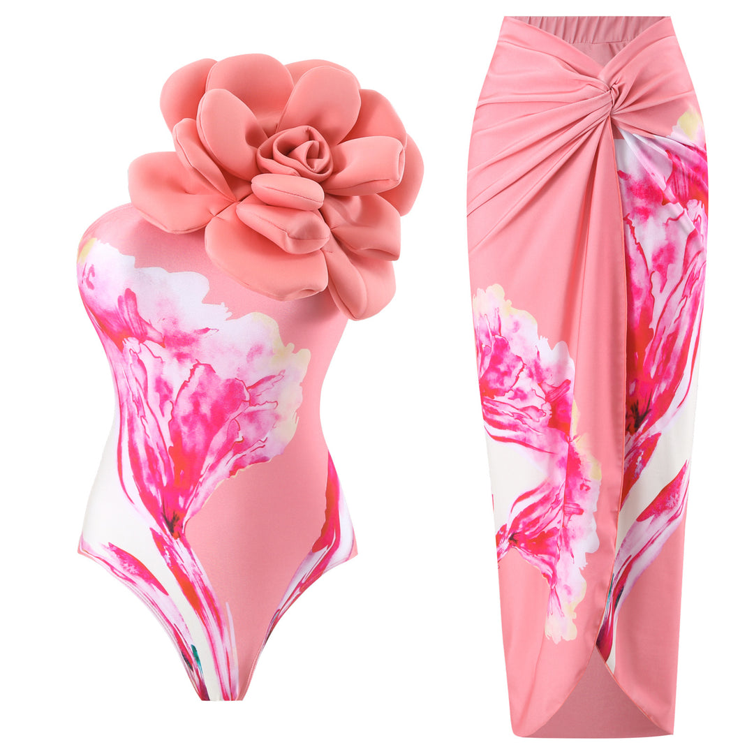 Dame badedragt med blomstret detalje og matchende sarong Stilla