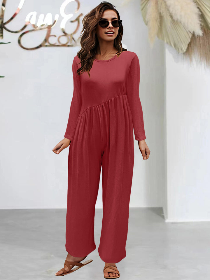 Dame mode jumpsuit med glitrende overdel og vidt skåret ben Stilla
