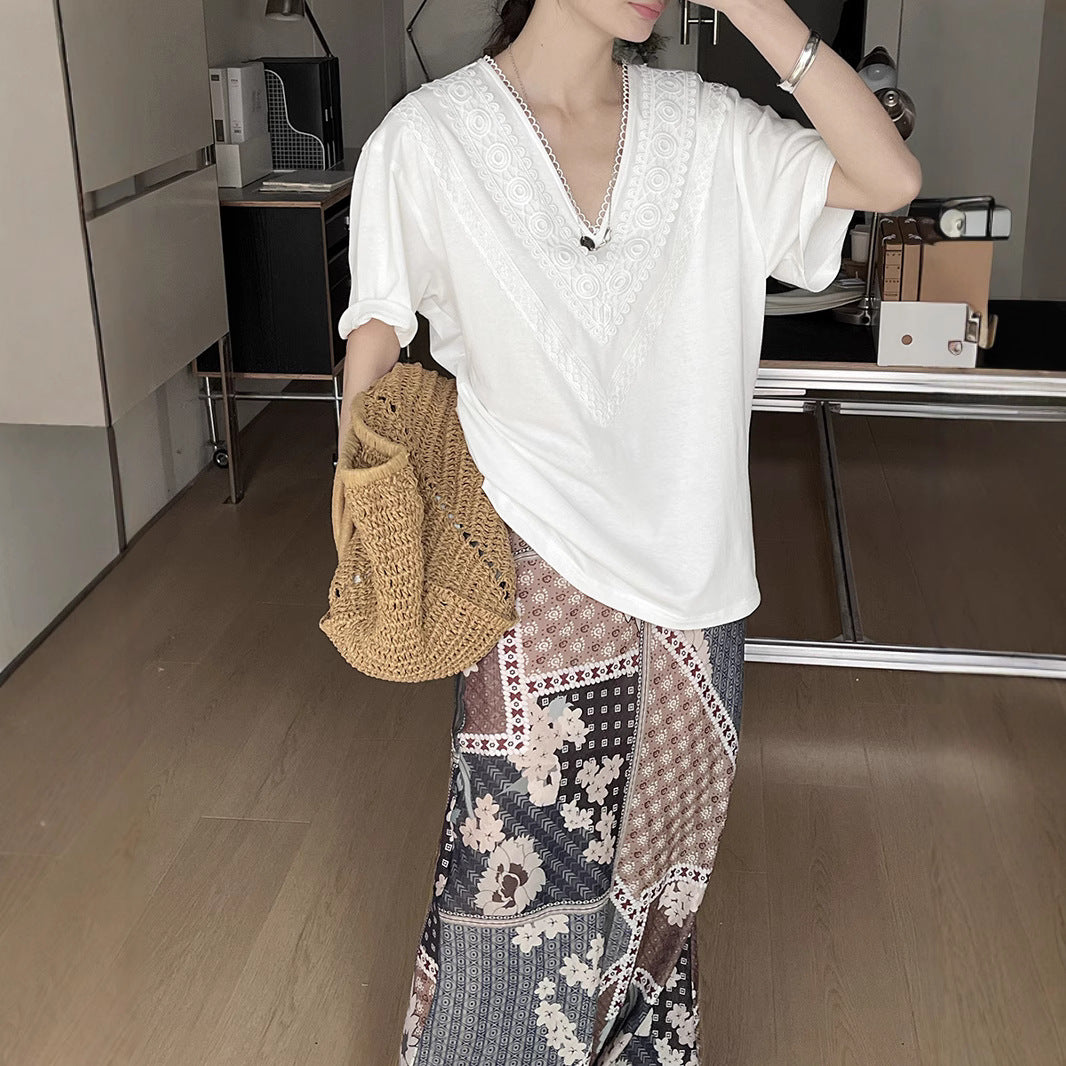 Dame elegant T-shirt med fine spidsede accenter og ensfarvet design Stilla