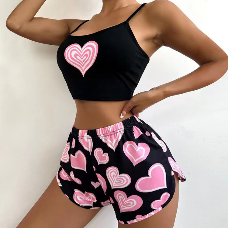 Dame fritids-crop-top og shorts sæt med kærligt hjerte-motiv Stilla