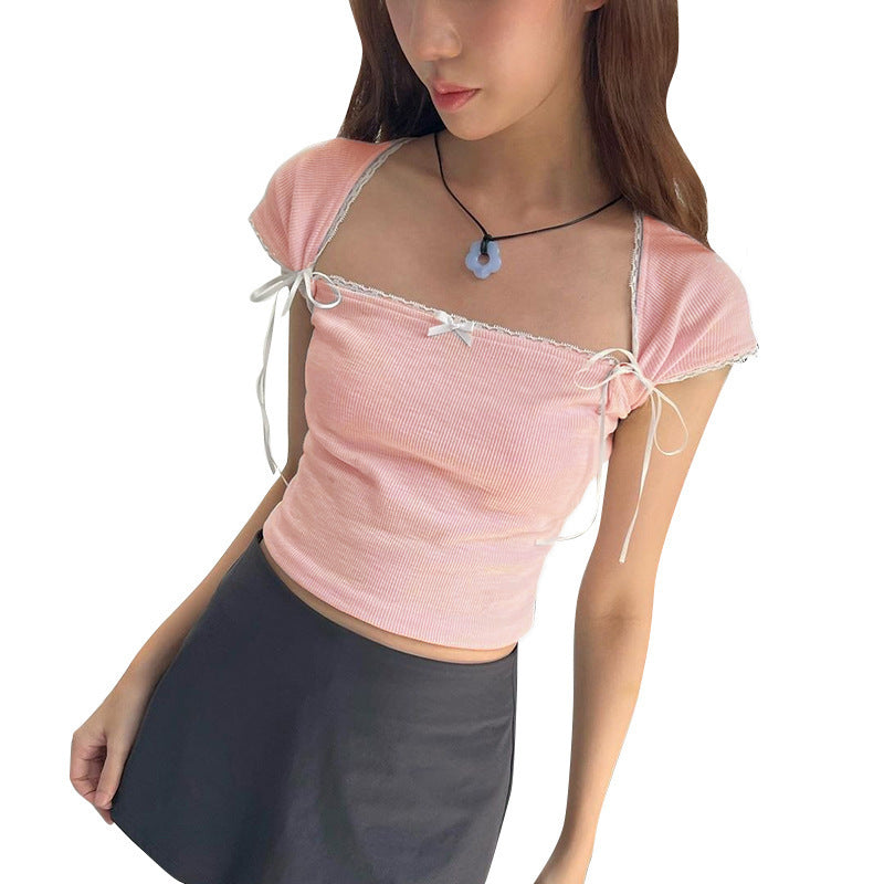 Dame Crop-top med justerbare spaghetti-stropper og elegante knude-detaljer Skovae