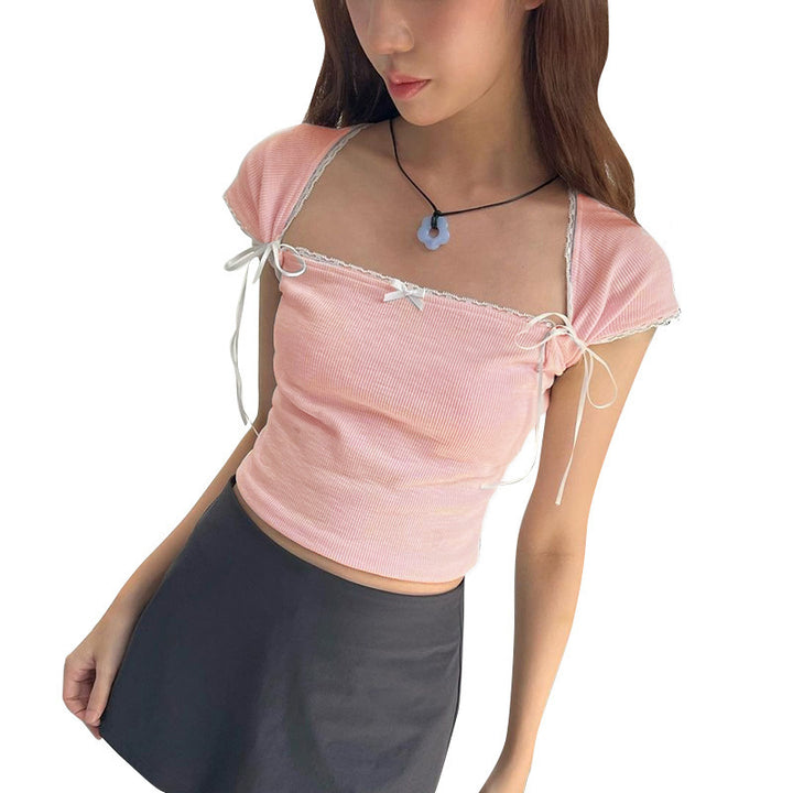 Dame Crop-top med justerbare spaghetti-stropper og elegante knude-detaljer Skovae