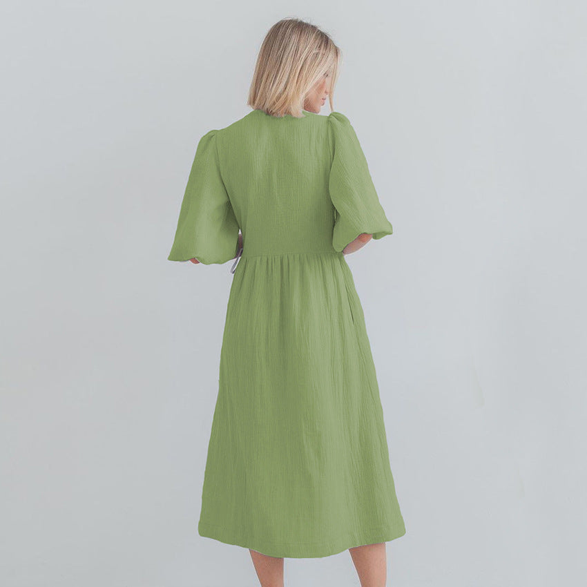 Dame vinklekjole med voluminøse ærmer og elegant V-hals Stilla