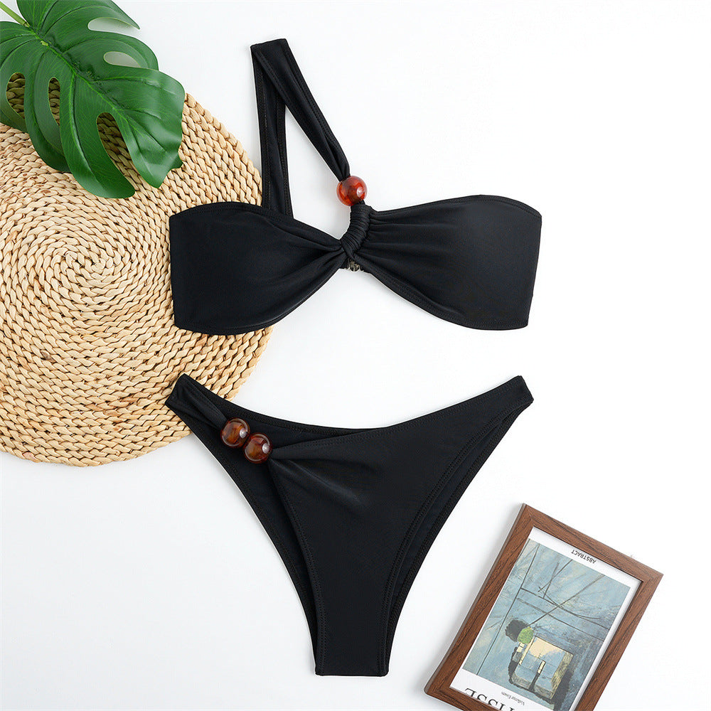 Dame Bikini-sæt med asymmetrisk Halter-neck og dekorative bukseknapper Skovae