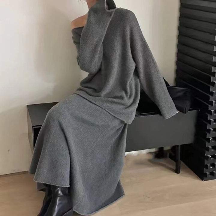 Kvinders strikkjole i et afslappet off-shoulder design med en bred pasform