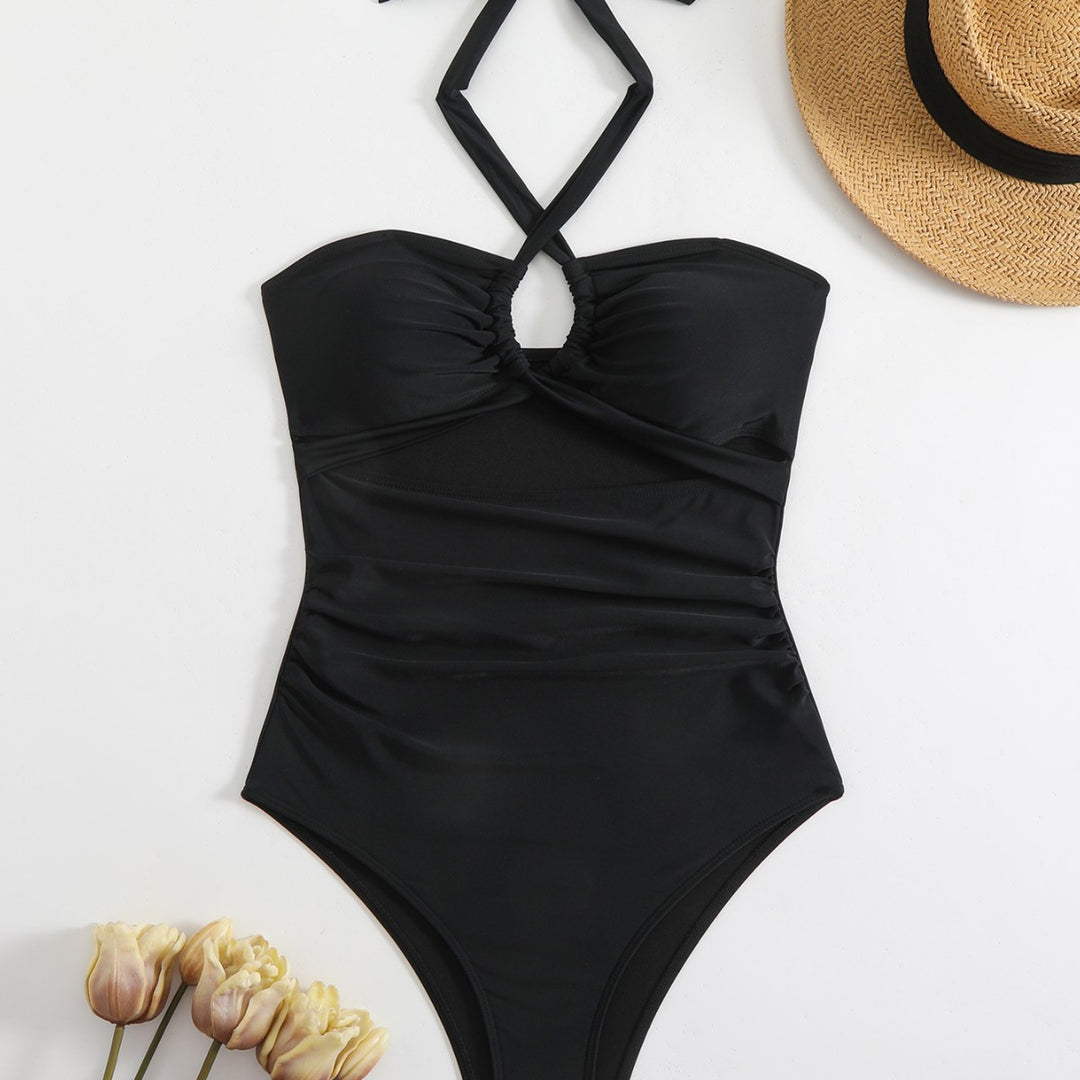 Dame One-piece badedragt med elegante ruffles og innovativ halterneck Skovae