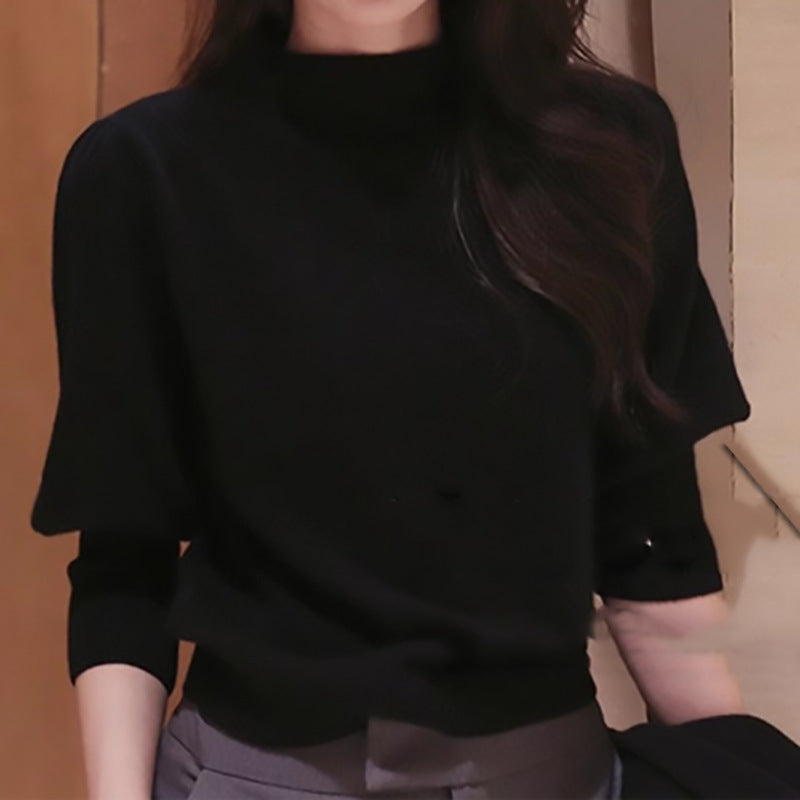 Dame elegant rullekrave sweater med voluminøse ærmer og ribdetaljer Stilla