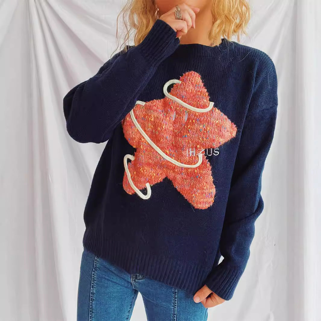 Kvindernes strikkede sweater med glitrende stjerne motiv og løs pasform Stilla